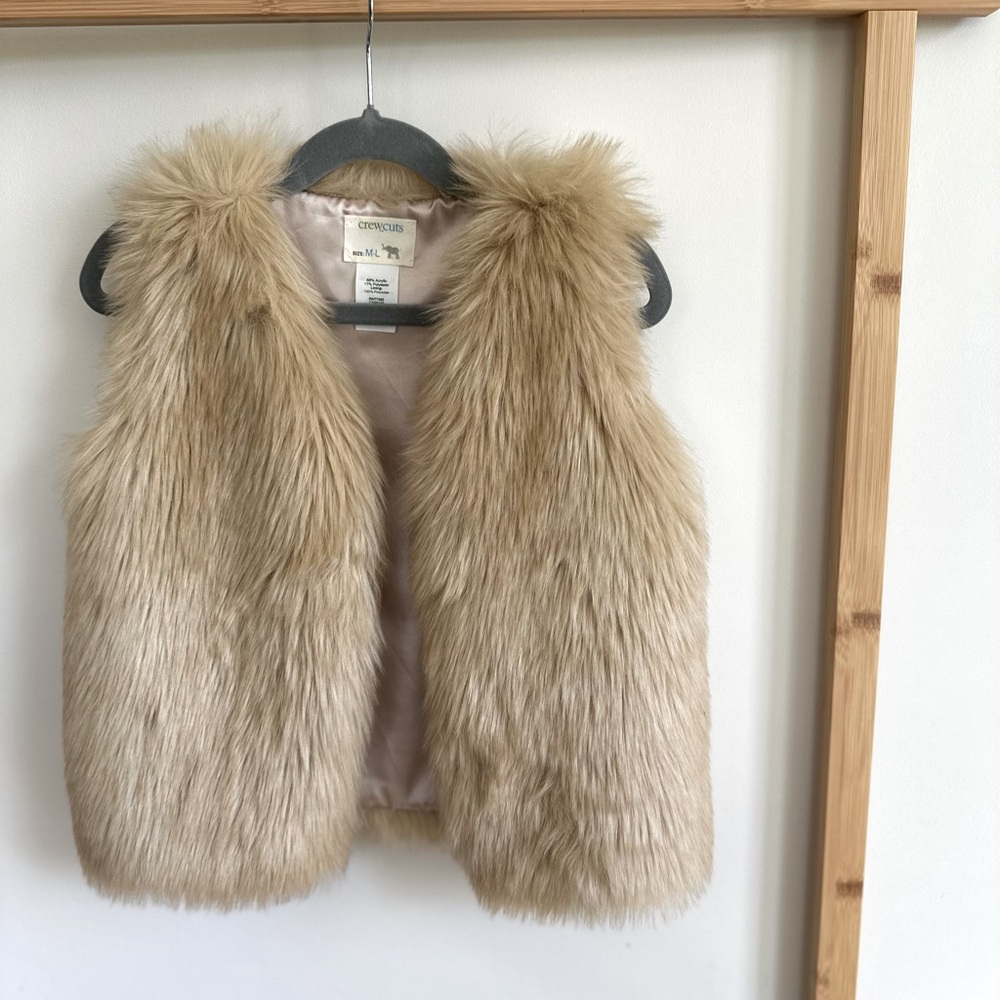 Jcrew faux fur vest medium/large tan. Fits 5T 6T & 7 year olds.
